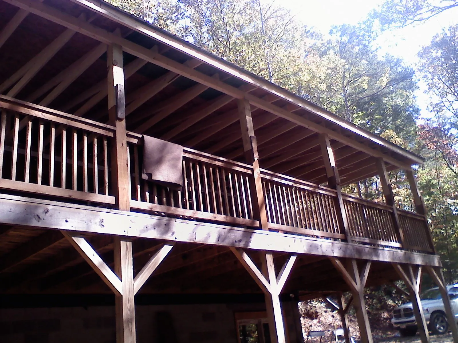 Timber framing under a new elevated porch and deck — Roof Leak Repair in Coupland by Roofing Brothers